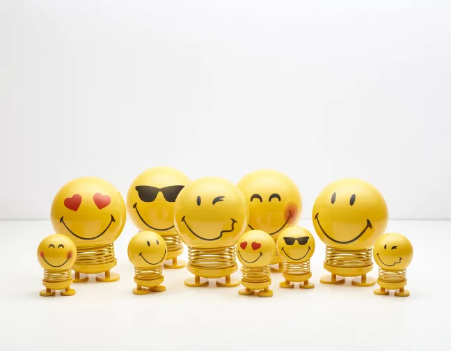 Hoptimist® Wackelfigur Smiley Cool S gelb